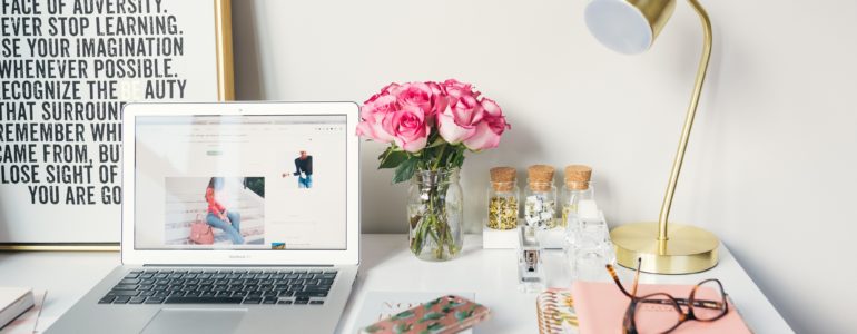 laptop and lamp and flowers